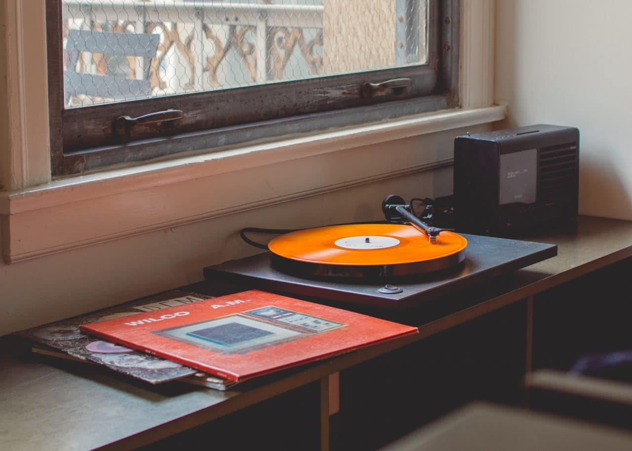 A vinyl record player.